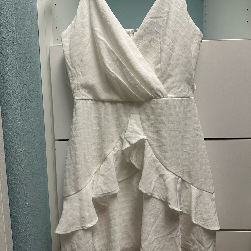 white mini ruffle dress